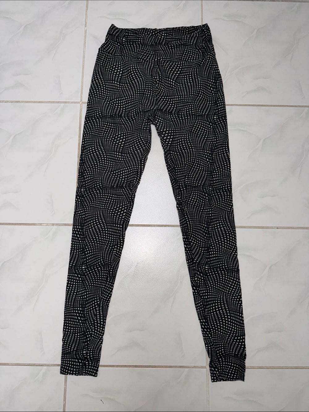 LuLaRoe Black Leggings with White Dot Wave Print